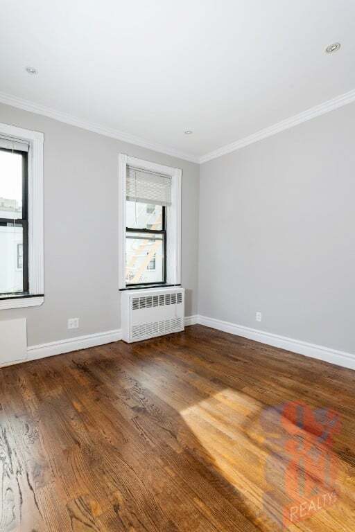 Photo - 213 E 26th St Unidad 2A