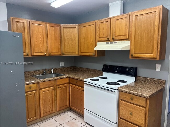 Building Photo - 9203 NW 38th Dr Unit 12