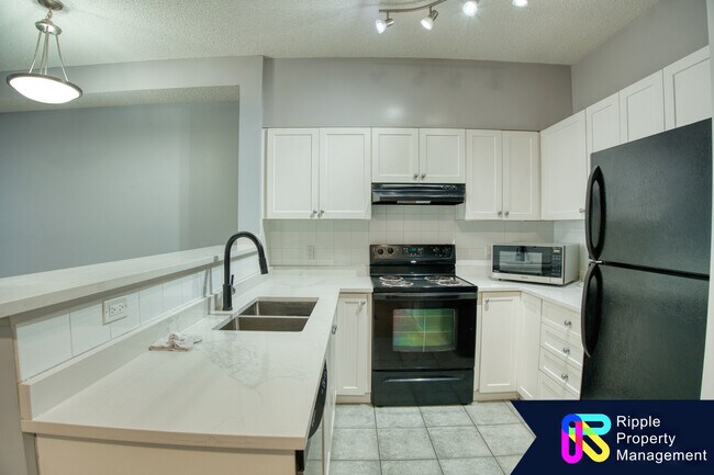 Photo - 333 Taravista Dr NE Unit 2403