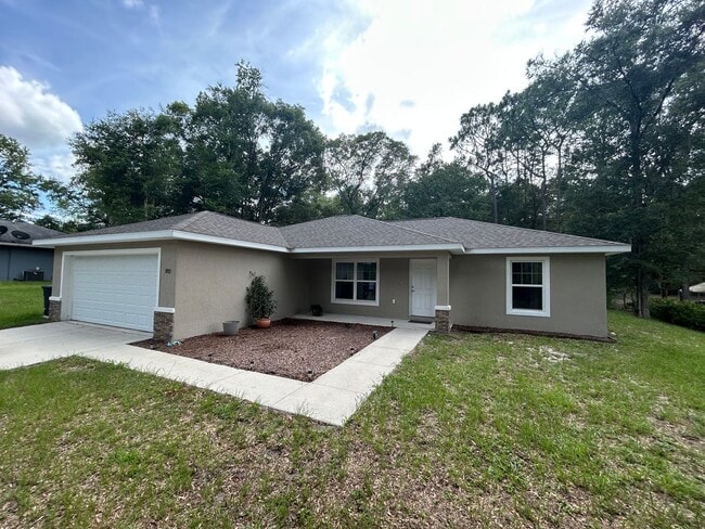 Building Photo - Rainbow Acres 3/2 Large Lot and Garage