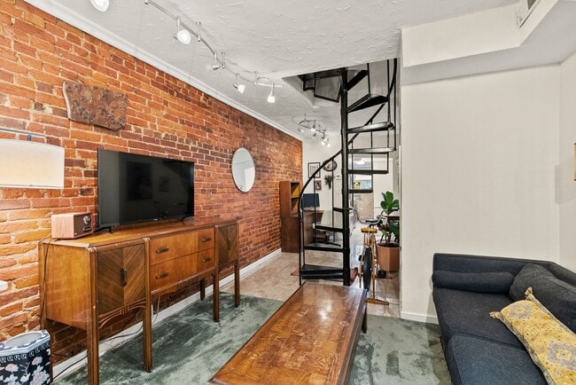Photo - Charming Row Home | 2 Bed | 1 Bath | 950 Sf | Fenced Backyard | 2 Surface Parking Spaces
