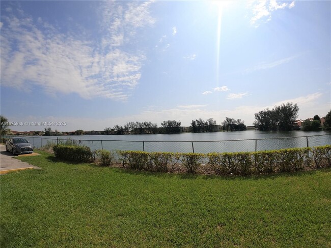 Building Photo - 9911 W Okeechobee Rd Unit 1-101 Rental