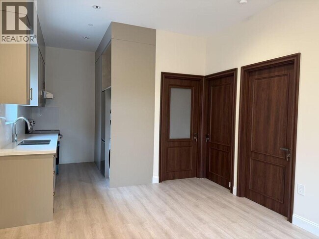 Photo - 1115 W 48th Ave