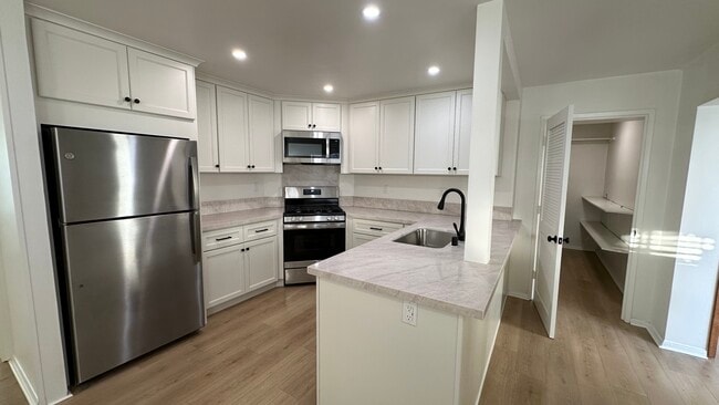 Remodeled kitchen with walk in pantry.