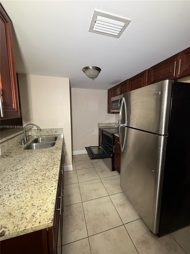 Photo - 1990 NW 4th Ct Condo Unit 7