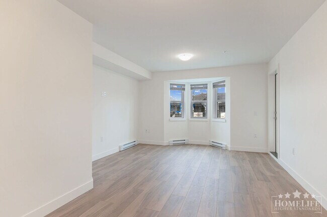 Photo - 2 Bed + 2 Bath + 1 Den Condo for Rent in L... Unit 203
