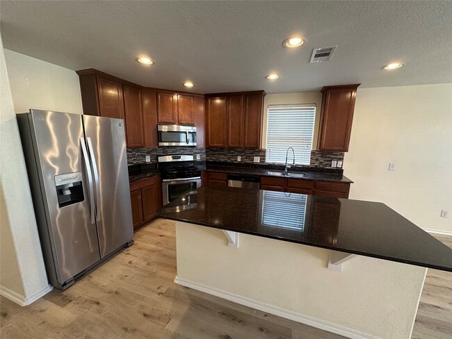 Building Photo - 5807 Camelia Evergreen Ln