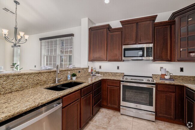 Building Photo - Newly updated townhouse with 2 car garage!