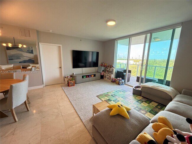 Building Photo - 15051 Royal Oaks Ln Unit 1104