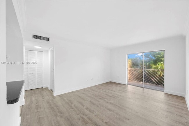 Building Photo - 4335 NW S Tamiami Canal Dr Unit 209