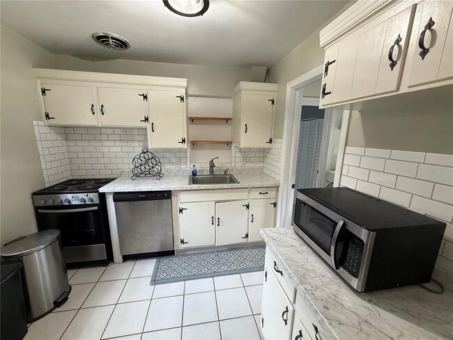Photo - 313 NW 34th Dr House