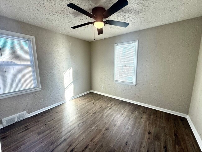 Photo - This beautifully updated 4-bedroom, 1-bath single-family home is ready for move-in!