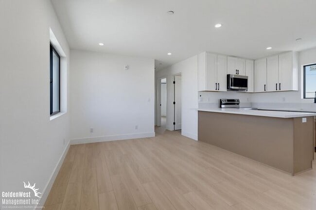 Photo - Newly Built 2Bdm 2Ba Upper-Level Apartment with Modern Finishes & Bright Open Living!