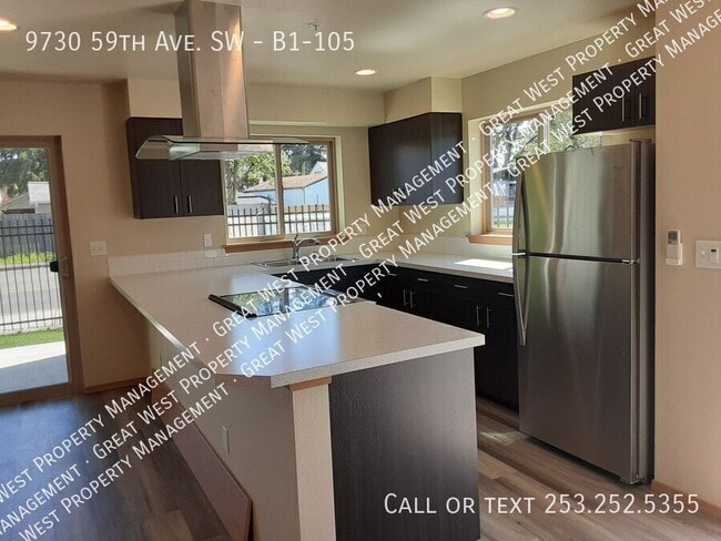 Building Photo - 9730 59th Ave SW Unit B1-105