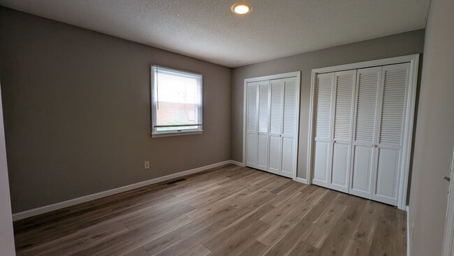 Photo - Updated Urbana Apartment with Balcony & Covered Parking