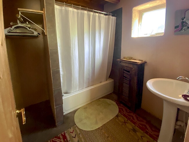 Bathroom with Shower and Washing Machine - 223 A Victor Ct