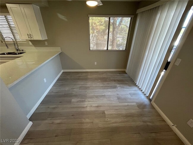 Building Photo - 6871 Tamarus St Unit 204