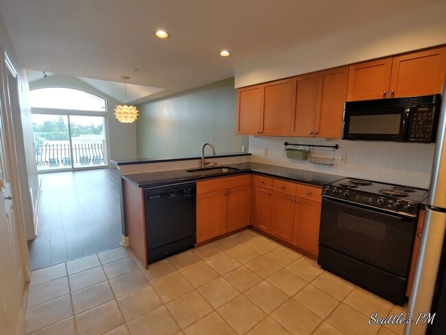Photo - Top Floor Condo Located in First Hill with 2 Parking Spots Included!!! Unit 504