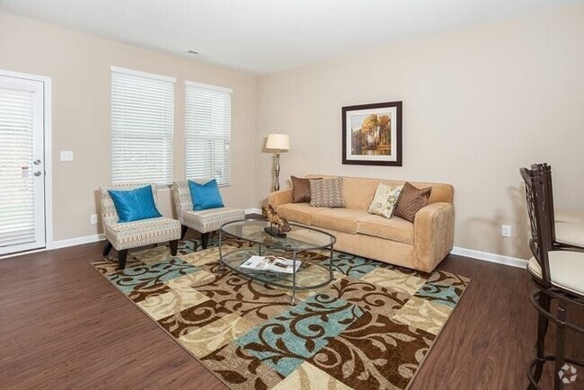Building Photo - Just Listed! 3-Bedroom Townhome in East Ra...