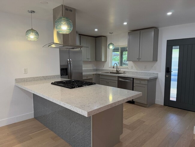 Photo - Fully Remodeled 3 Bedroom/ 2 Bathroom Duplex w/ Modern Finishes & Private Yard! Unit 1063-A