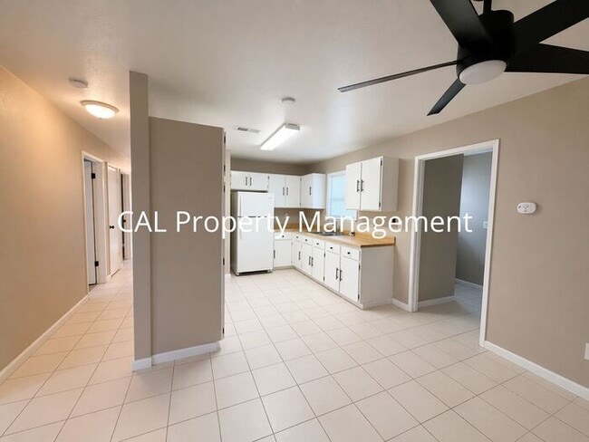 Photo - Spacious 4-Bedroom Home with 2-Car Garage & Backyard Oasis