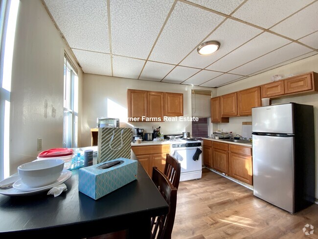 Building Photo - 1572 Tremont St Rental