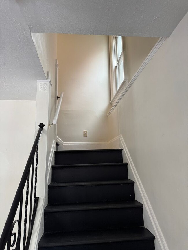 Photo - Single Family Home 3 bedroom 1 bath new paint flooring with basement fenced in yard