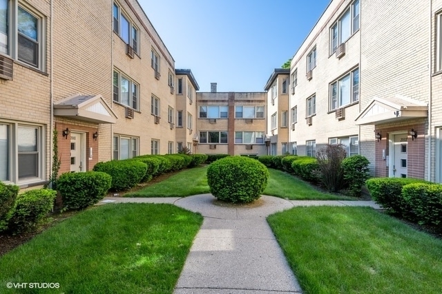 Building Photo - 2003 W Touhy Ave Unit 203
