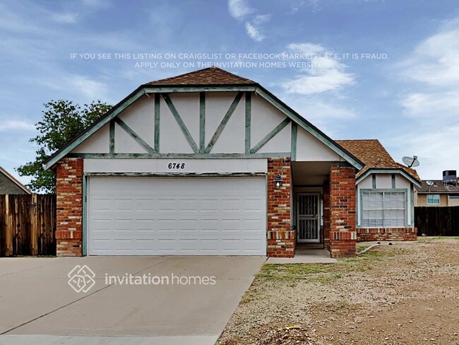 Building Photo - 6748 W Cinnabar Ave Rental