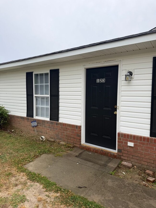 Building Photo - THE VILLAS IV Unit 123