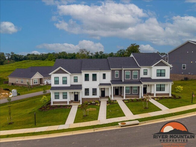 Photo - Well-Located Townhome with Private Off-Street Parking