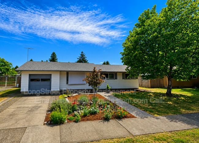 Building Photo - 310 NE Cambridge Cir