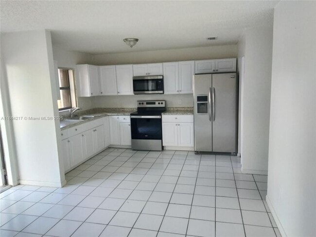 Building Photo - 26245 SW 141st Pl
