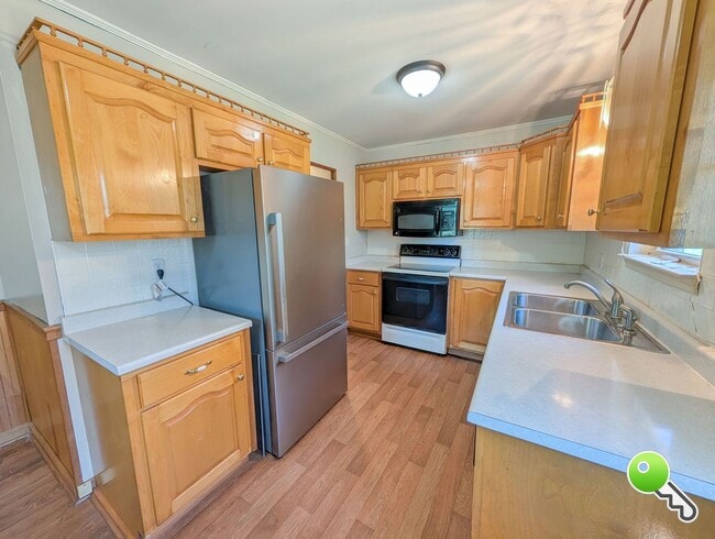Photo - Charming 3BR Home with Covered Parking & Fenced Yard