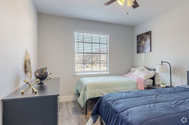 2BR, 1.5BA - 890SF - Secondary Bedroom