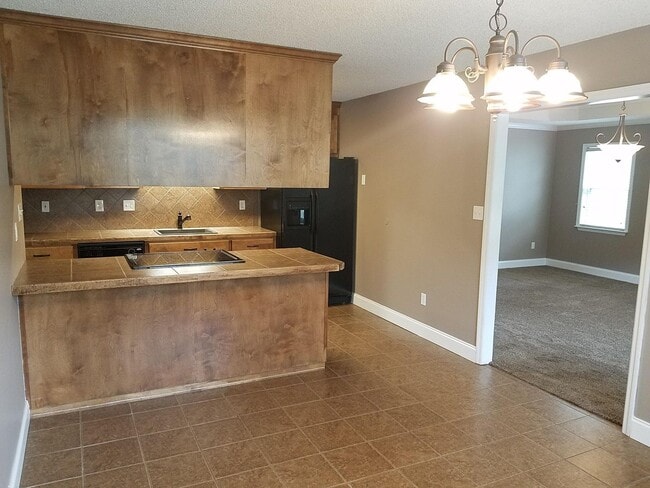 Photo - Spacious 3BR Brick Home with Open Split Floor Plan & Tiled Back Porch on Nearly an Acre