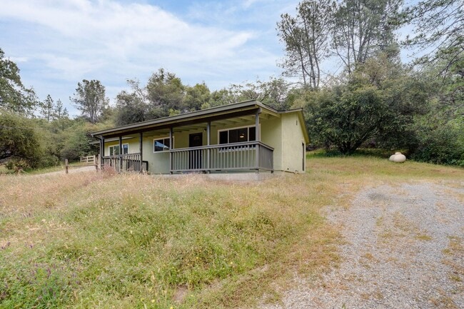 Building Photo - Peaceful Country Living with Updated Bathroom and Covered Porch