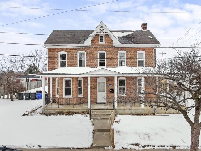 Building Photo - Charming 3-Bedroom Single-Family Home with Wrap-Around Porch & Private Fenced Yard