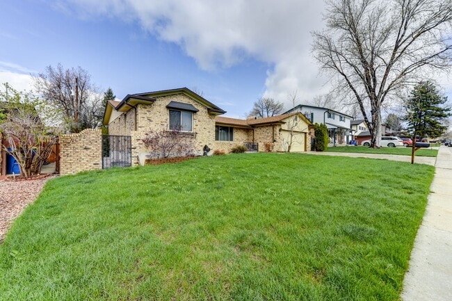 Photo - Great 4 Bedroom 3 Bath Home with 2 Car Garage and Covered Patio!