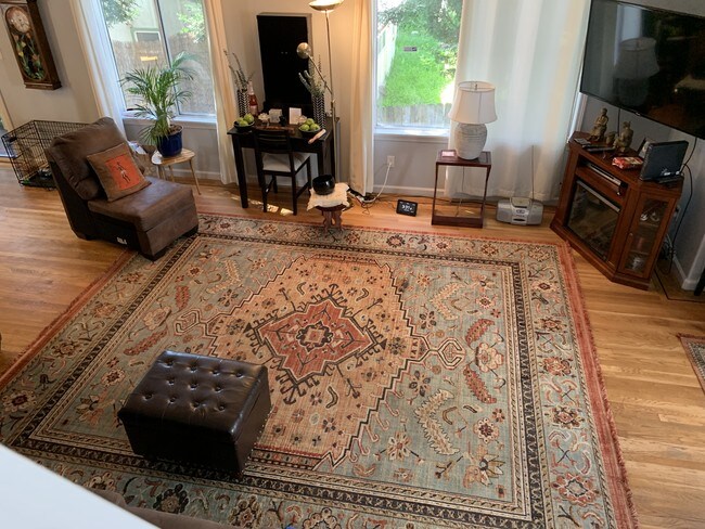 living room from stairwell - 3819 Buell St