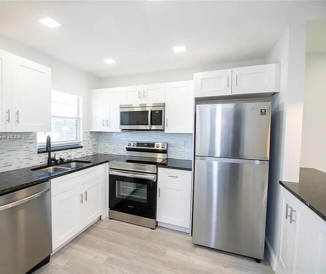 Photo - 2755 W Atlantic Ave Unidad FIRST ENCOUNTER