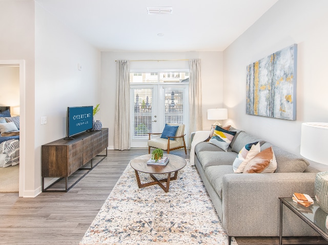Living Room - Overture Greenville	 55+ Active Adult Apar...