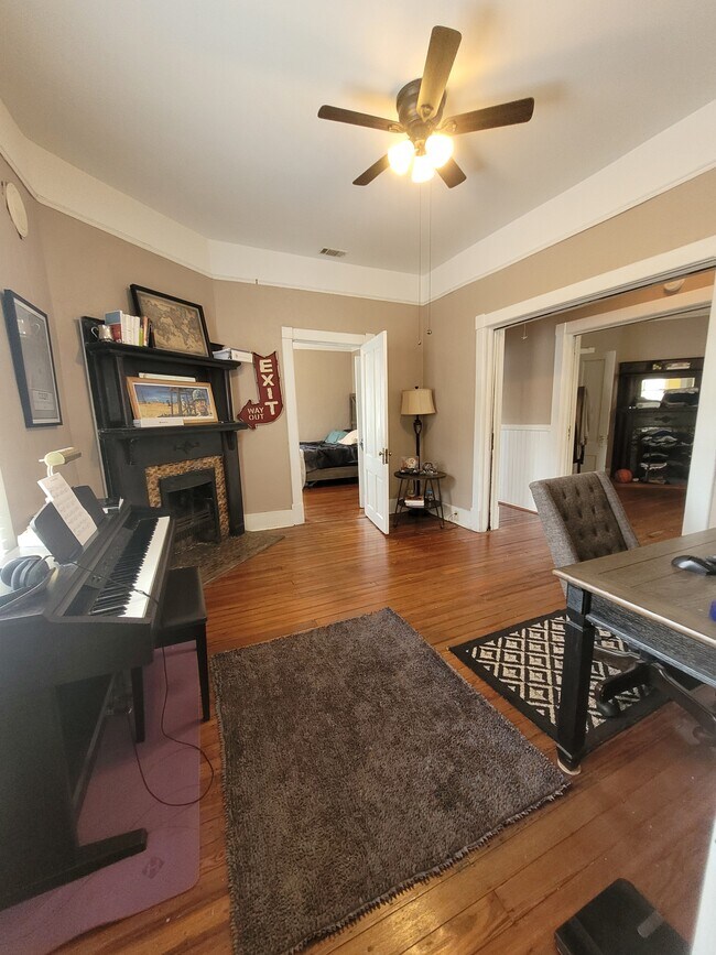 View from bathroom door into Back Parlor/Dining w view into back Bedroom, Hall, & Front Parlor/Livin - 1217 Java Pl Unit Upstairs