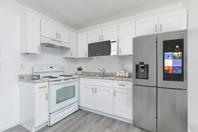 Apt with New Kitchens - Cottonwood Village Apartments