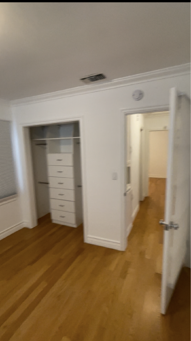 Bedroom 1 with closet Organizer, 2 windows - 1200 Pine Ave