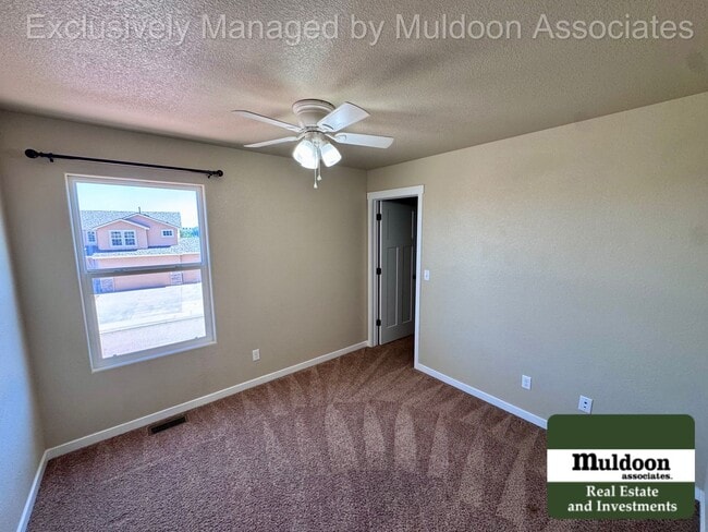 Photo - Spacious 5 Bedroom, 3.5 Bath Home with 3-Car Garage, and Pet-Friendly Living in 80925!
