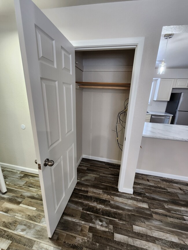 Front closet with cable hook-up - 800 E Blind Nick Dr Unit 1B