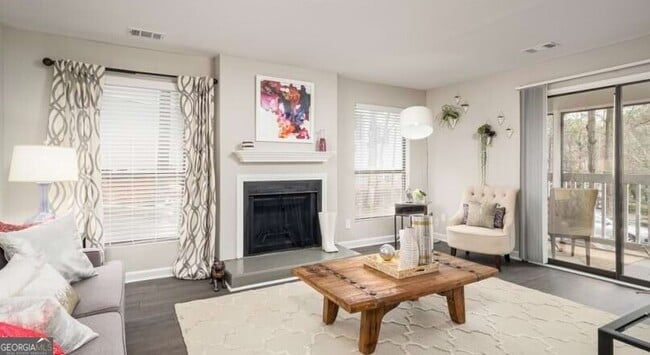 Photo - 7100 Roswell Rd Unidad 1304