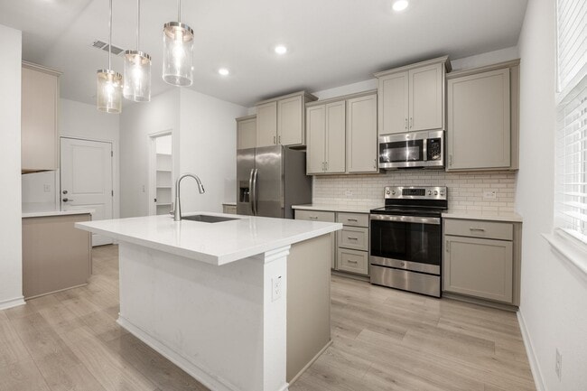 Photo - Spacious 4 Bed / 3 Bath in Liberty Hill – Quartz Kitchen, Hot Tub + Flexible W/D Option