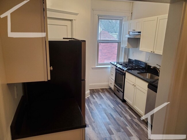 Photo - No Brokers Fee, Large Unit in Allston, Balcony, On-Site Maintenance, Laundry, heat, Hot Water Inc...